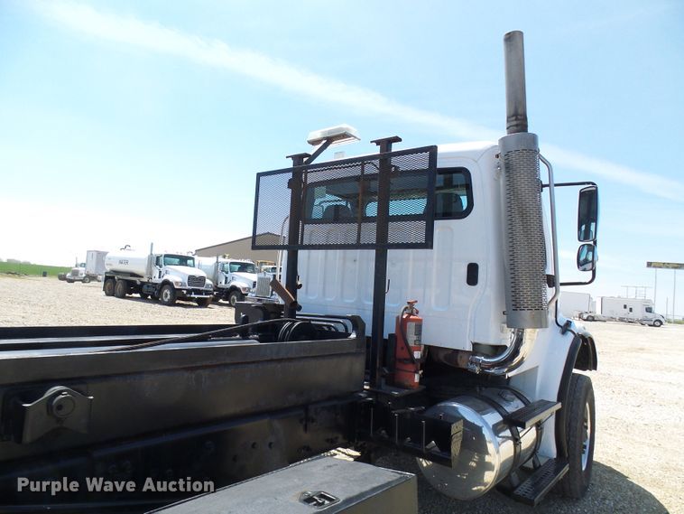 image for item DG2115 2007 Freightliner Business Class M2  roll off container truck