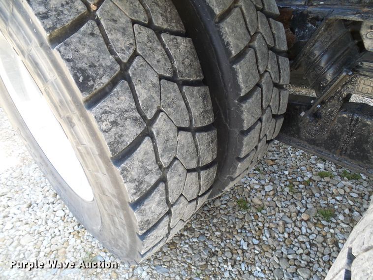 image for item DG2115 2007 Freightliner Business Class M2  roll off container truck