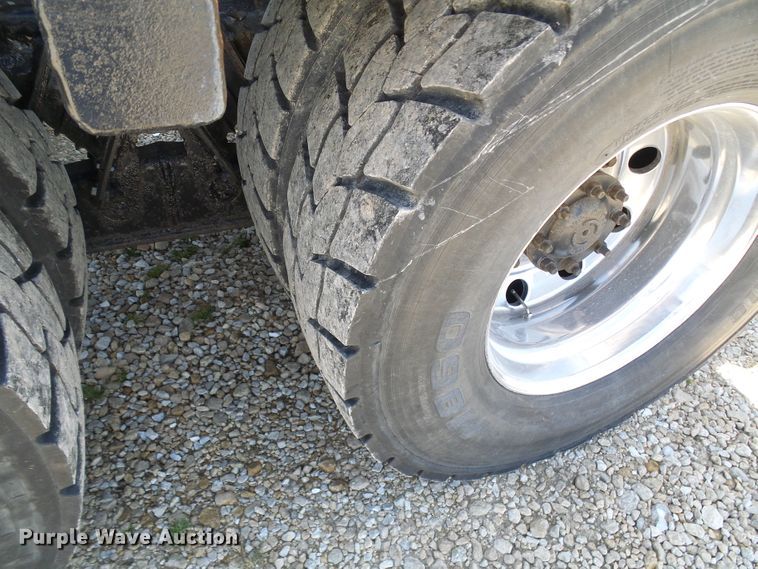 image for item DG2115 2007 Freightliner Business Class M2  roll off container truck