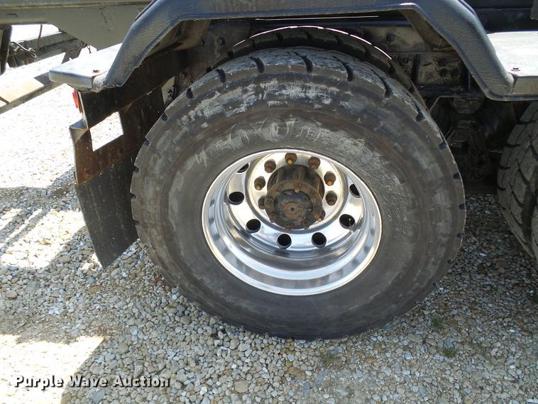 image for item DG2115 2007 Freightliner Business Class M2  roll off container truck