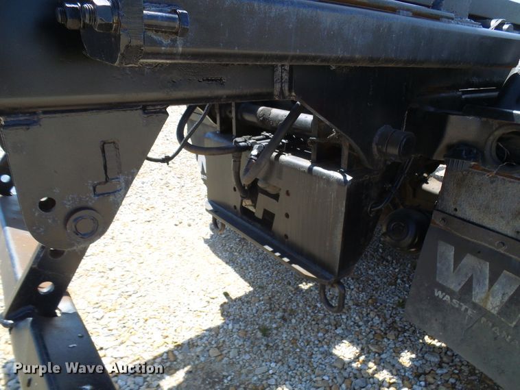 image for item DG2115 2007 Freightliner Business Class M2  roll off container truck