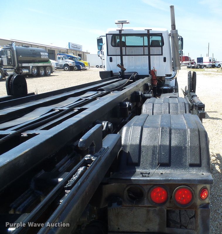 image for item DG2115 2007 Freightliner Business Class M2  roll off container truck