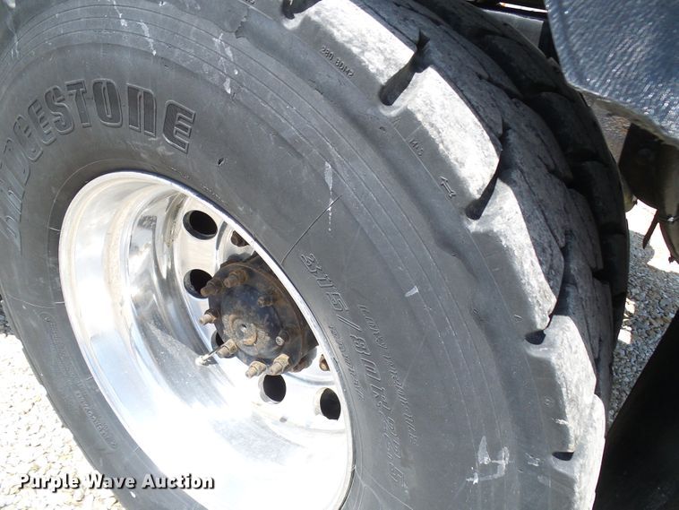 image for item DG2115 2007 Freightliner Business Class M2  roll off container truck