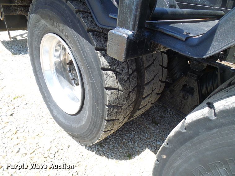 image for item DG2115 2007 Freightliner Business Class M2  roll off container truck