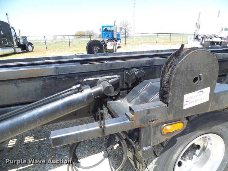 image for item DG2115 2007 Freightliner Business Class M2  roll off container truck