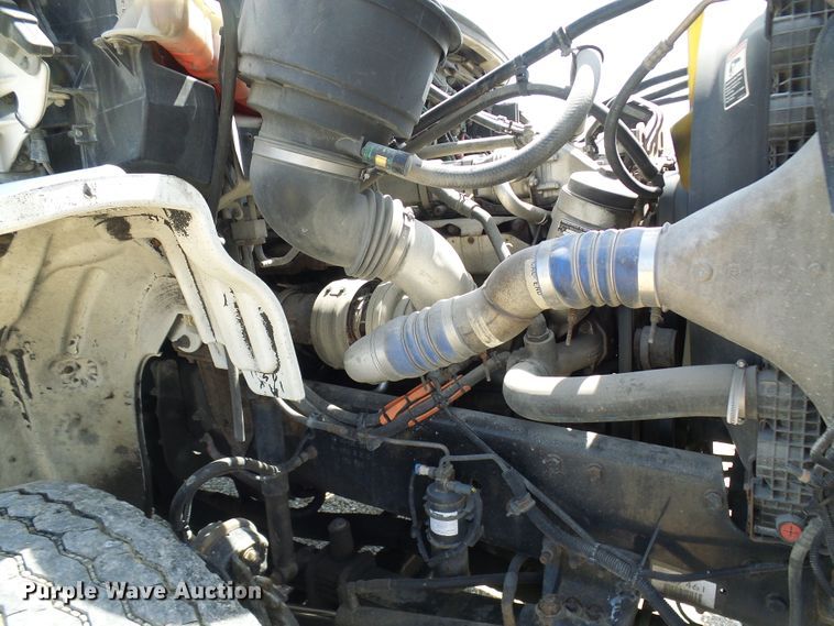 image for item DG2115 2007 Freightliner Business Class M2  roll off container truck