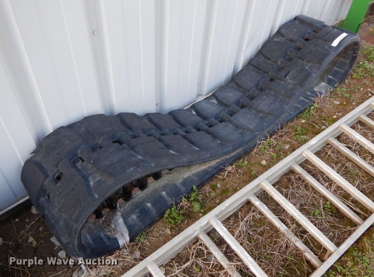 image for item IL9265 (2) sets of skid steer tracks