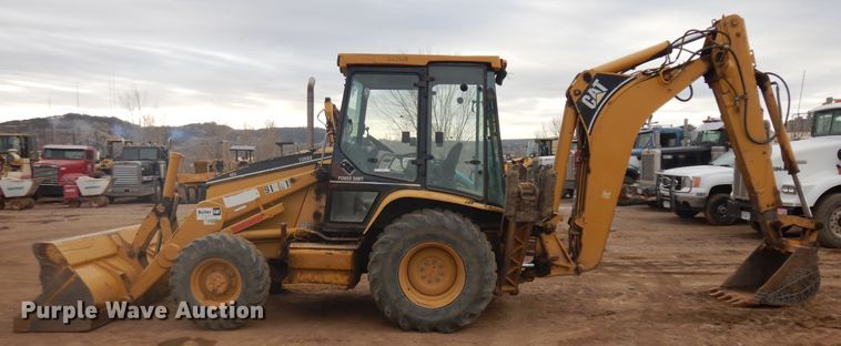 image for item IP9161 1999 Caterpillar 426C  backhoe
