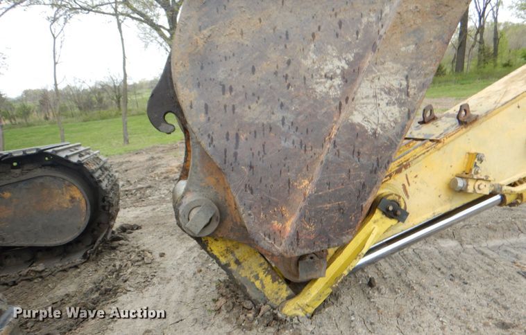 image for item IQ9249 2000 Kobelco SK210LC  excavator