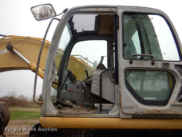 image for item IQ9249 2000 Kobelco SK210LC  excavator