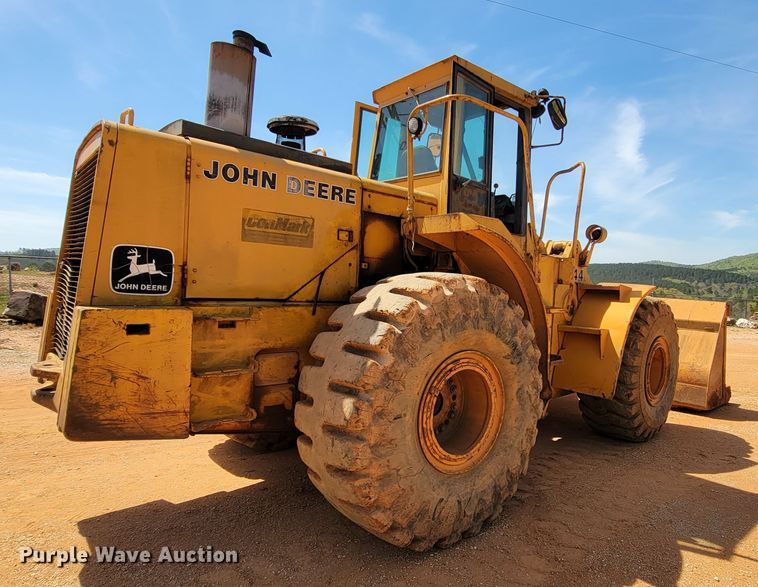 image for item IV9001 1988 John Deere 844  wheel loader