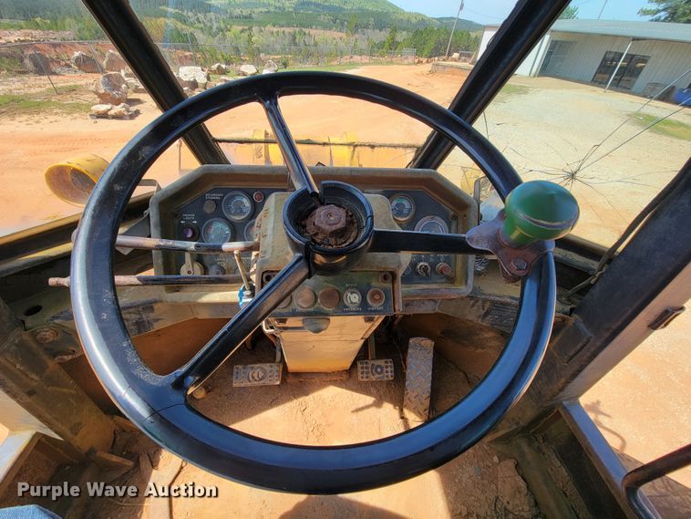 image for item IV9001 1988 John Deere 844  wheel loader