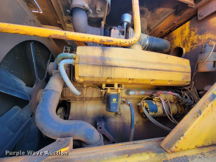 image for item IV9001 1988 John Deere 844  wheel loader