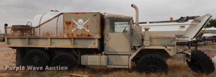 image for item DC2138 1984 Am General  flatbed truck