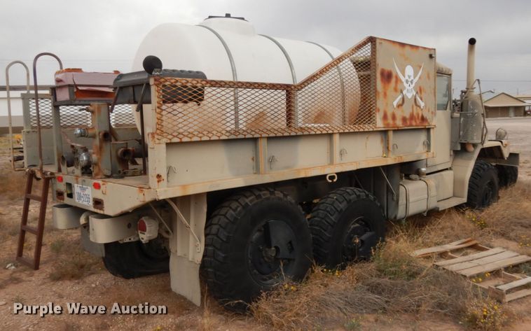 image for item DC2138 1984 Am General  flatbed truck