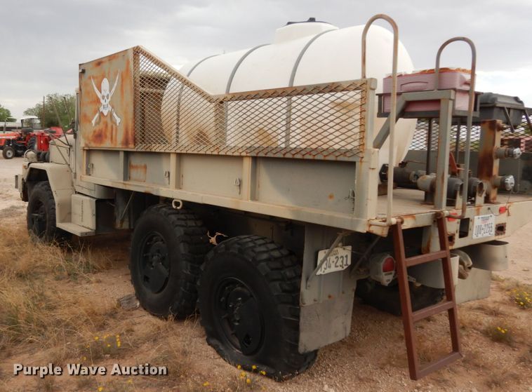 image for item DC2138 1984 Am General  flatbed truck