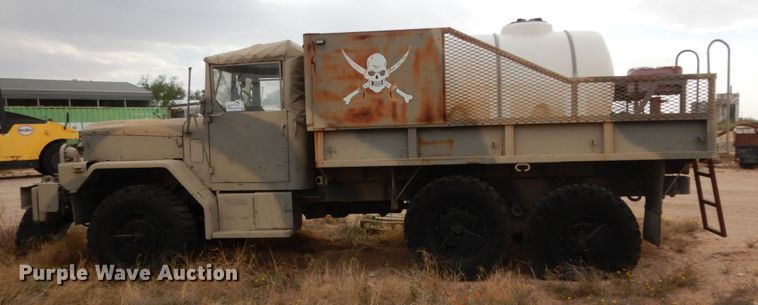 image for item DC2138 1984 Am General  flatbed truck