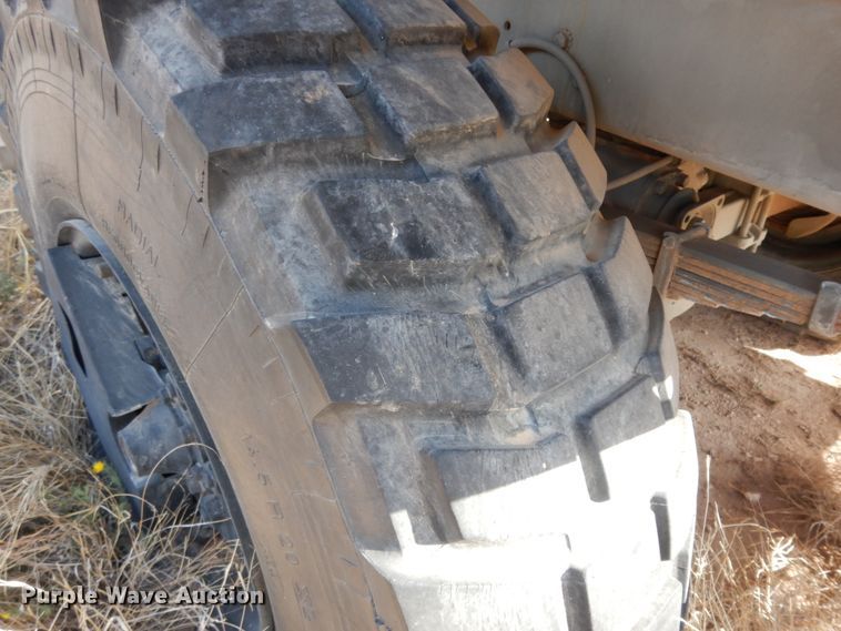 image for item DC2138 1984 Am General  flatbed truck