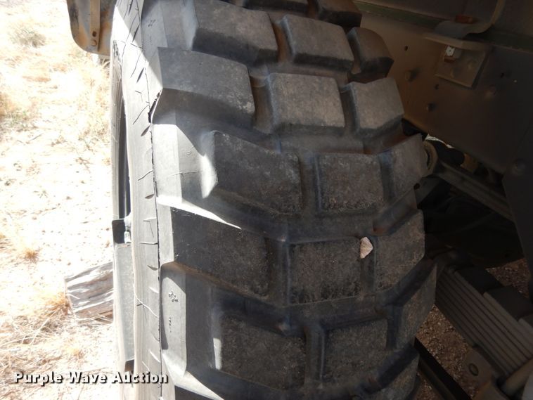 image for item DC2138 1984 Am General  flatbed truck