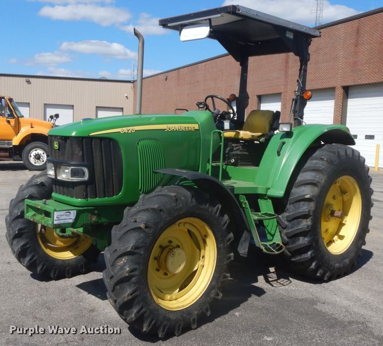 image for item DF6517 2003 John Deere 6420  MFWD tractor