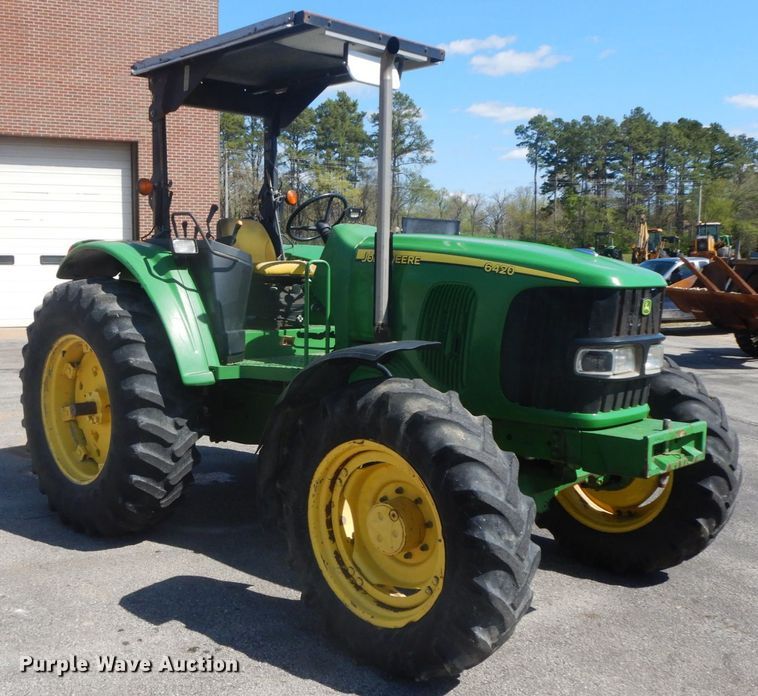 image for item DF6517 2003 John Deere 6420  MFWD tractor