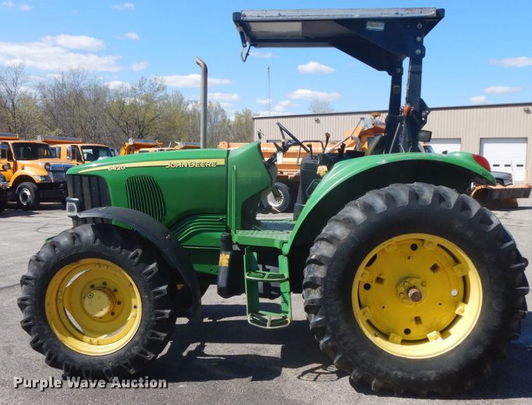 image for item DF6517 2003 John Deere 6420  MFWD tractor