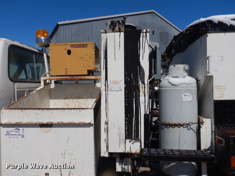 image for item DJ1209 1992 Ford F700  pot hole patcher truck