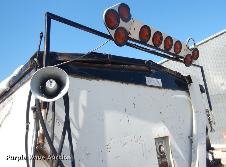 image for item DJ1209 1992 Ford F700  pot hole patcher truck