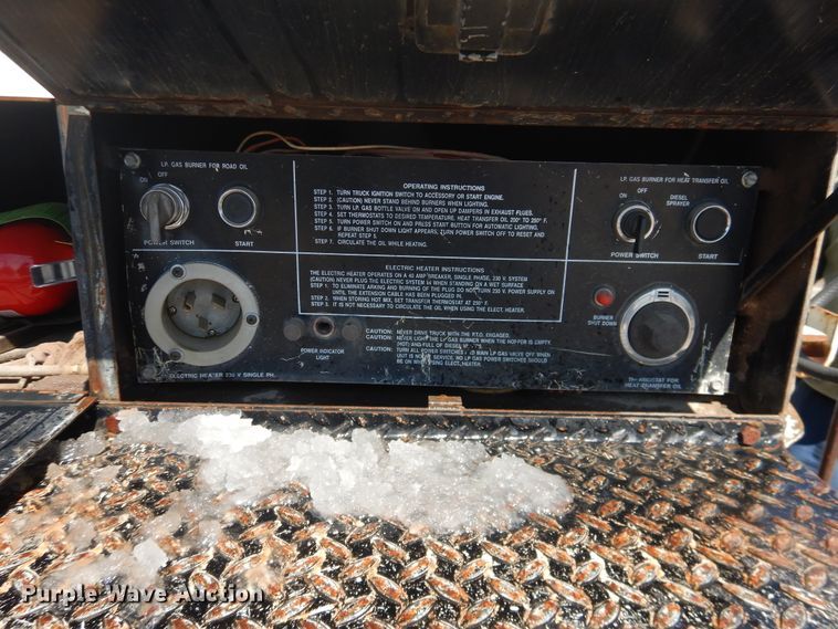 image for item DJ1209 1992 Ford F700  pot hole patcher truck