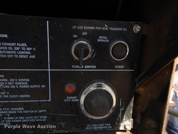 image for item DJ1209 1992 Ford F700  pot hole patcher truck