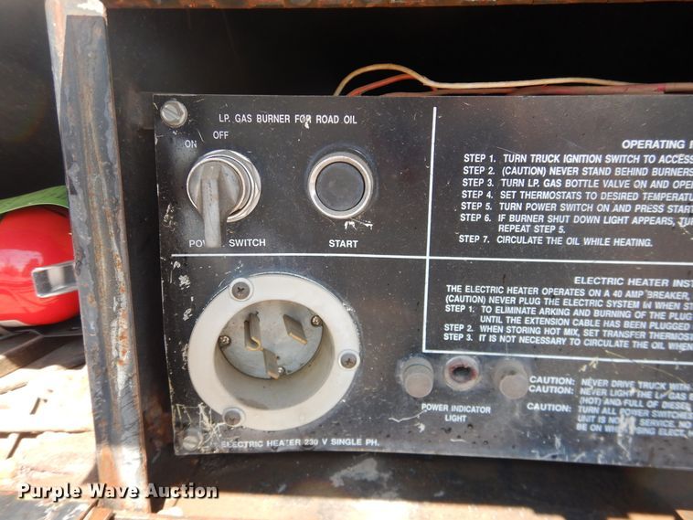 image for item DJ1209 1992 Ford F700  pot hole patcher truck