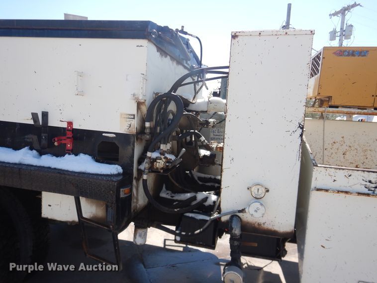 image for item DJ1209 1992 Ford F700  pot hole patcher truck