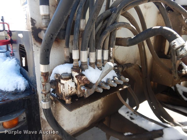 image for item DJ1209 1992 Ford F700  pot hole patcher truck