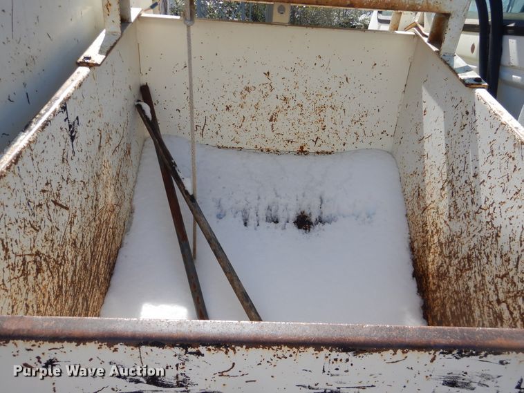 image for item DJ1209 1992 Ford F700  pot hole patcher truck