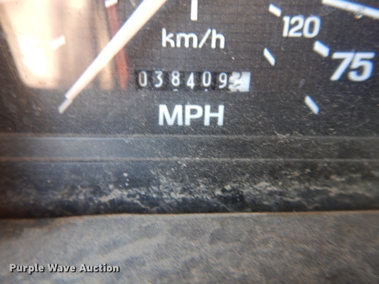 image for item DJ1209 1992 Ford F700  pot hole patcher truck