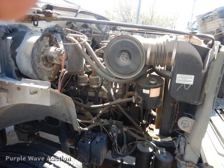 image for item DJ1209 1992 Ford F700  pot hole patcher truck