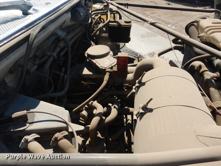 image for item DJ1209 1992 Ford F700  pot hole patcher truck