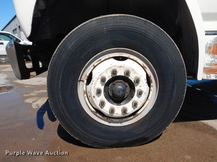 image for item DJ1209 1992 Ford F700  pot hole patcher truck