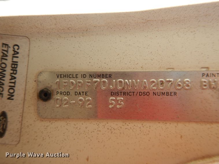 image for item DJ1209 1992 Ford F700  pot hole patcher truck