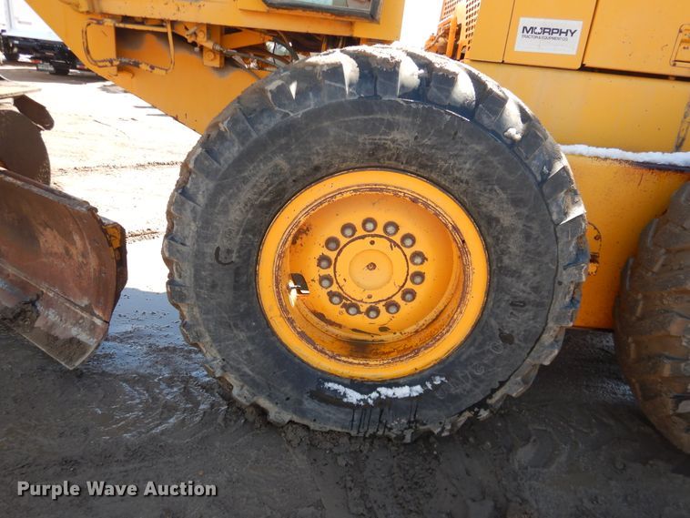 image for item DJ1211 1988 John Deere 670B  motor grader