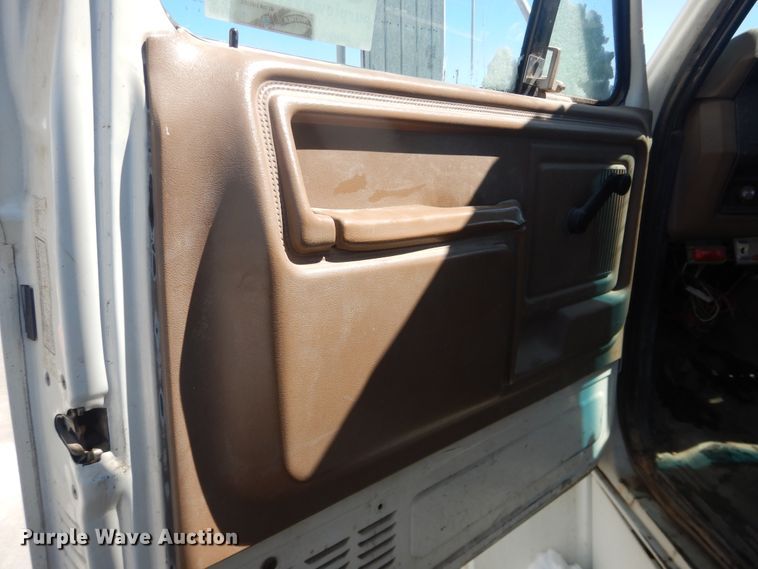 image for item DJ1214 1994 Ford F700  dump truck