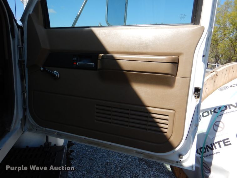 image for item DL2970 1999 GMC C7500  digger derrick truck