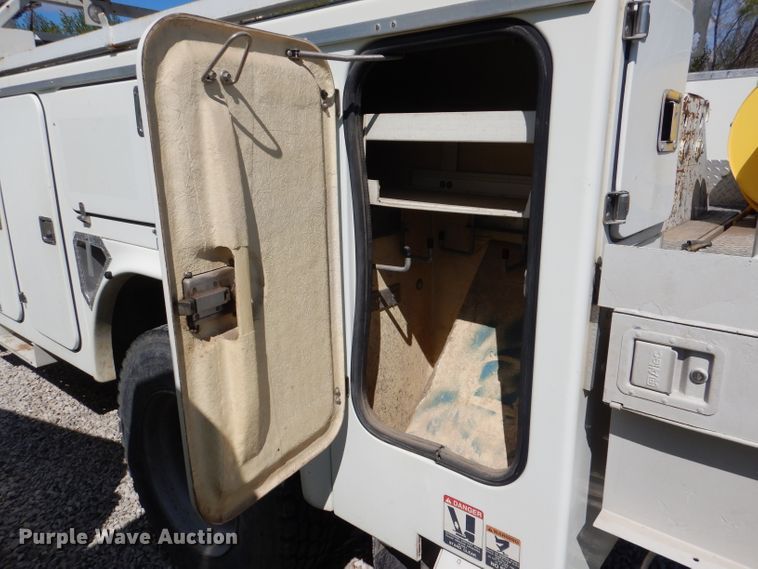 image for item DL2970 1999 GMC C7500  digger derrick truck