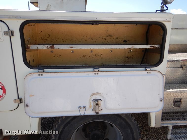 image for item DL2970 1999 GMC C7500  digger derrick truck