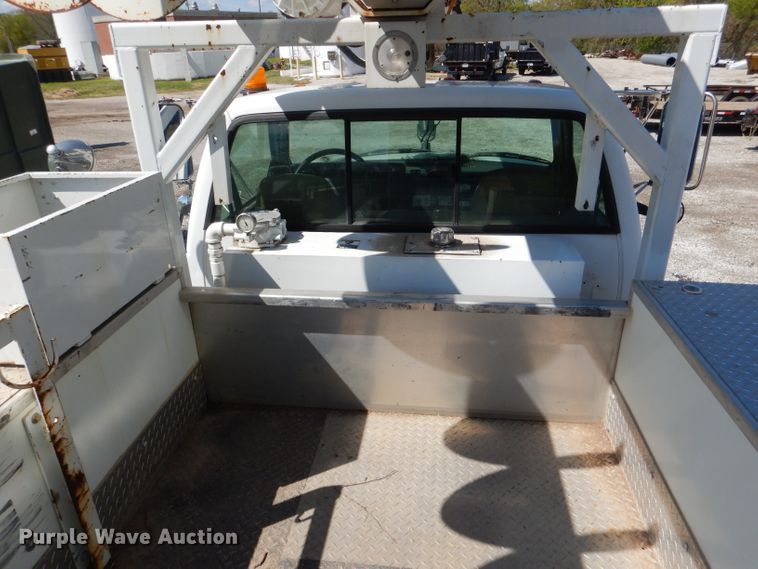 image for item DL2970 1999 GMC C7500  digger derrick truck