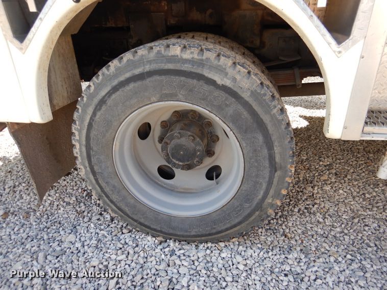 image for item DL2970 1999 GMC C7500  digger derrick truck