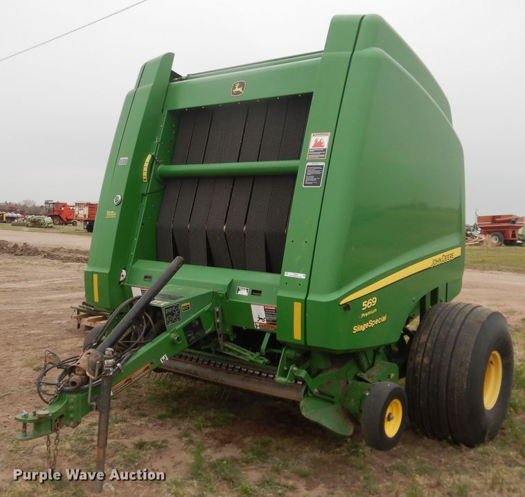 image for item IJ9308 2013 John Deere 569 Premium  round baler