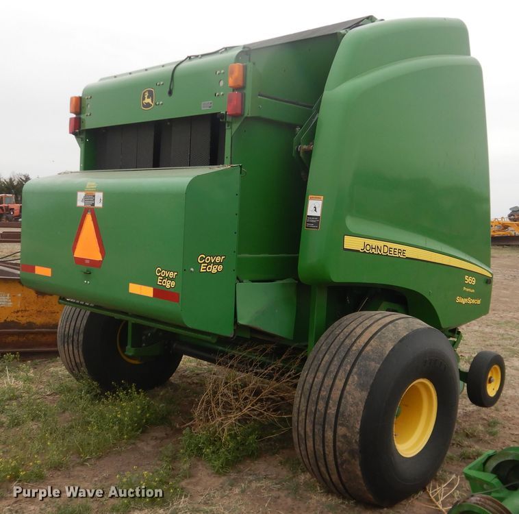 image for item IJ9308 2013 John Deere 569 Premium  round baler