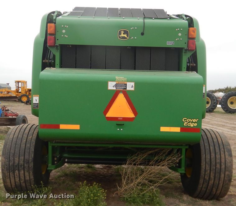 image for item IJ9308 2013 John Deere 569 Premium  round baler