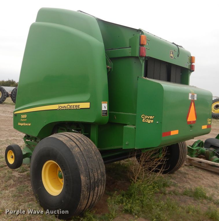 image for item IJ9308 2013 John Deere 569 Premium  round baler